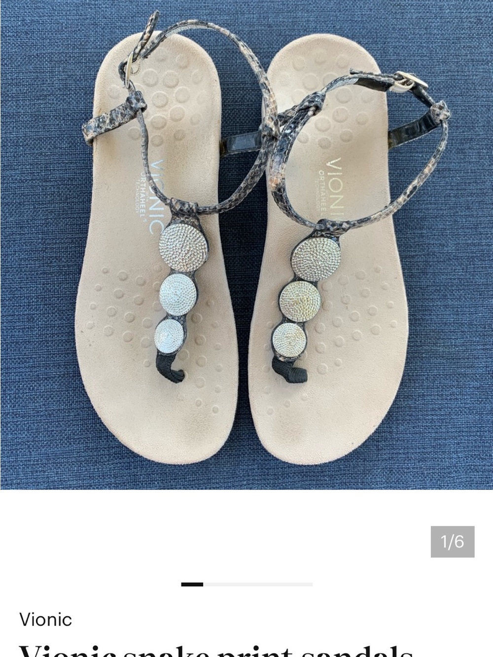Vionic Snake-Print T-Strap Sandals in Beige and Black with Silver-tone accents.